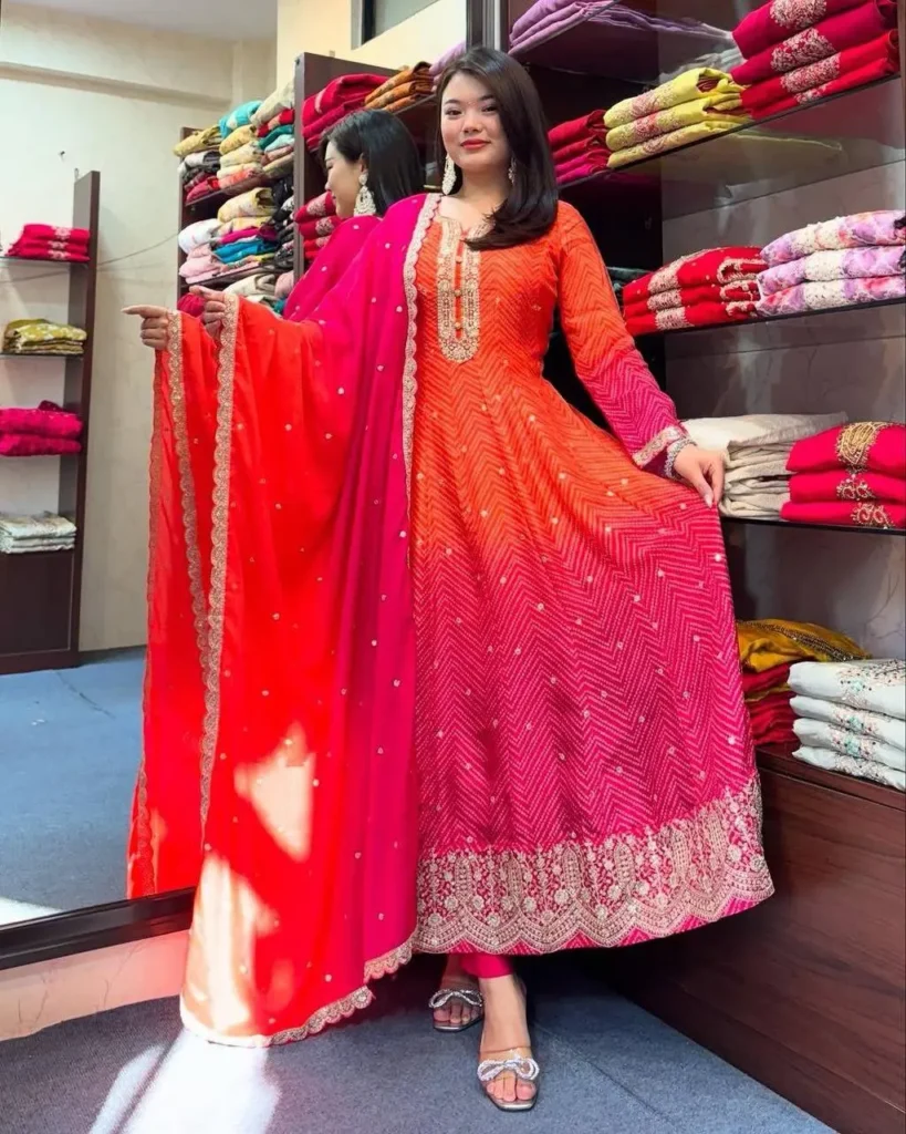 Orange and pink embroidered Anarkali gown set with matching dupatta – festive and wedding collection