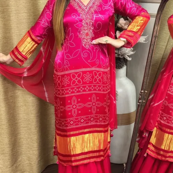 Hot pink Bandhani kurti set with orange accents and matching palazzo