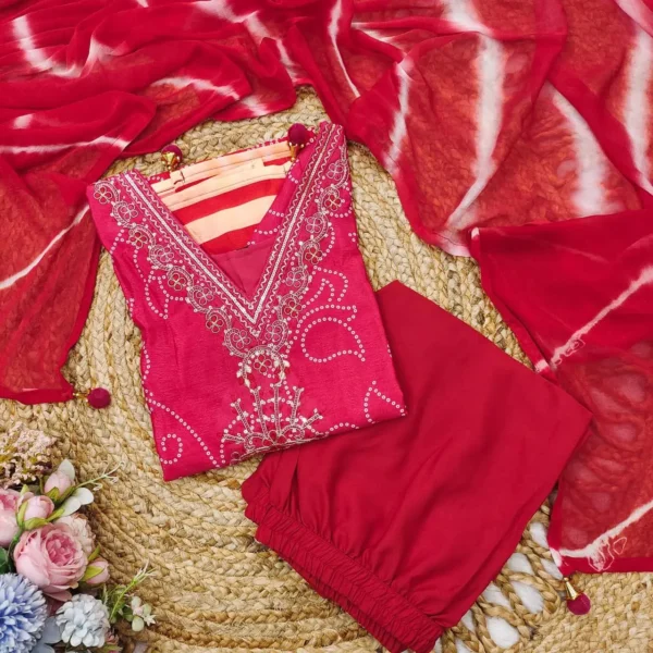 Hot pink Bandhani kurti set with orange accents and matching palazzo