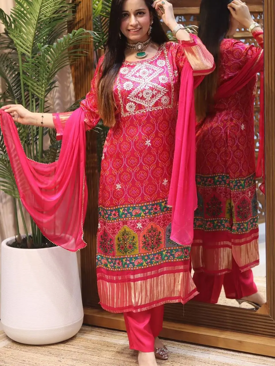 Pink Masleen Kurti Set with Bandhani-style print, embroidered neckline, and festive multicolored border – ethnic wear for Ganesh Chaturthi and festivals.